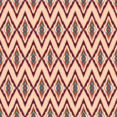 ikat Abstract Ethnic art. Seamless pattern in tribal, folk embroidery, and Mexican style. Aztec geometric art ornament print.Design for carpet, cover.wallpaper, wrapping, fabric, clothing