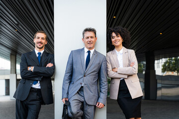 Multiethnic business people meeting in a business park - Multiracial group of corporate colleagues 