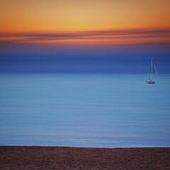 Fototapeta premium Sunset Over The Ocean - generative AI