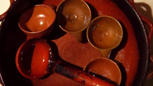 Preparation of queimada alcohol drink during San Juan holiday in Galicia, Spain
