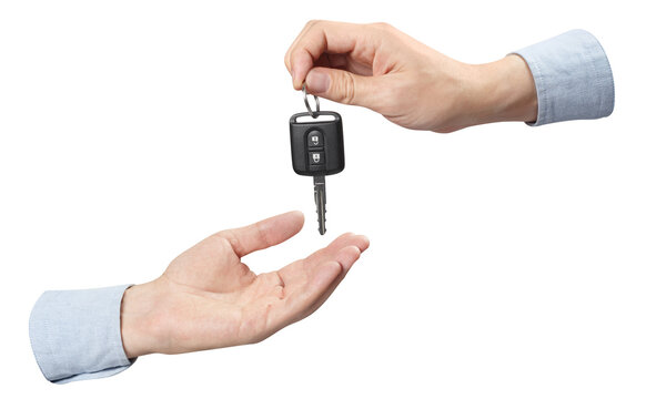 Two hands,sharing a car key, cut out