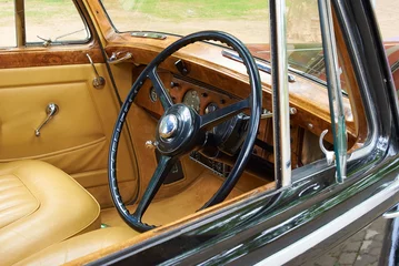 Poster luxurious interior of vintage bentley car © digitalstock