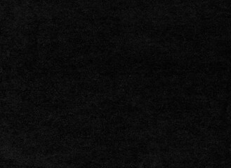 Texture of black paper with dust, hairs and bumps
