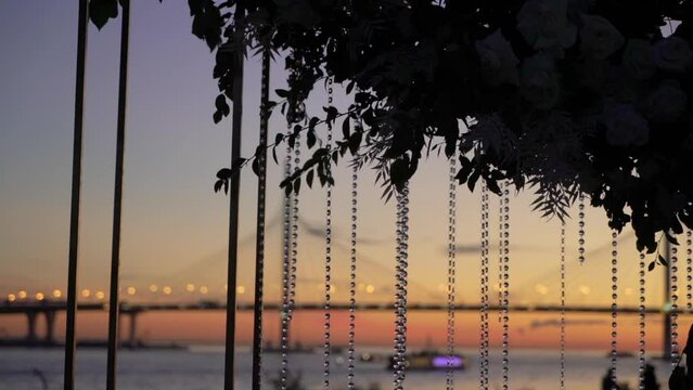 Modern cable-stayed bridge. A road across a river or sea. WHSD - western high-speed diameter in St. Petersburg, Russia. Yachts and boats are sailing. Sunset or sunrise.