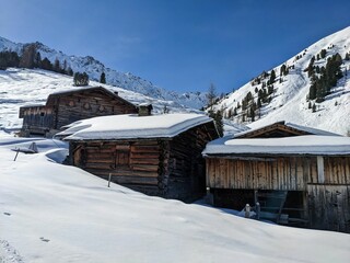 beautiful alp in the grison mountains, maeschenboden near monstein davos. winter mountain landscape. High quality photo.