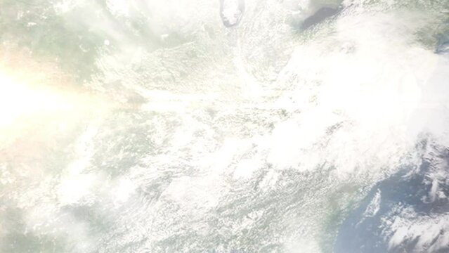 Earth zoom in from outer space to city. Zooming on Hopkinsville, Kentucky, USA. The animation continues by zoom out through clouds and atmosphere into space. Images from NASA