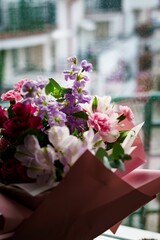 Fototapeta na wymiar Closeup of bouquet of flowers in pink and purple