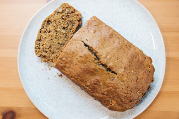 Zucchini Bread Loaf and Slices on a Floral Plate with Natural Lighting