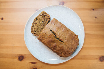 Zucchini Bread Loaf and Slices on a Floral Plate with Natural Lighting