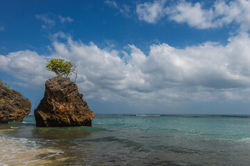 View of the sea from a tropical beach with an expressive sky. Beach in Bali, Indonesia - nature, recreation, background