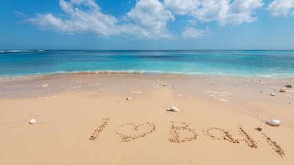 View of the sea from a tropical beach with an expressive sky. Beach in Bali, Indonesia - nature, recreation, background