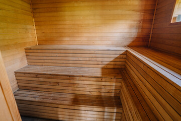 Sauna from the inside, benches and stove