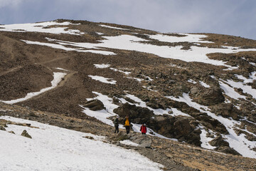 Hiking in the mountains at winter