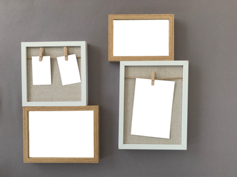 two rectangular photo frames png, two frames with notes attached with a wooden clothespin png, background in grey