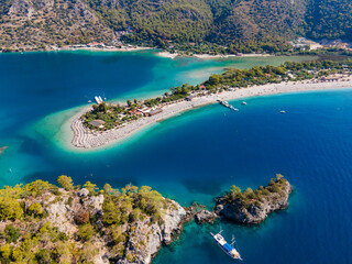 Aerial drone photo of Ölüdeniz, Fethiye, Turkey, showcasing the turquoise waters, picturesque coastline, and beautiful beaches of this popular summer destination.