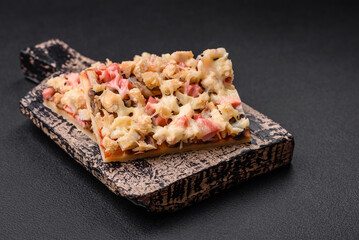 Delicious homemade pizza with sausage, mushrooms and cheese