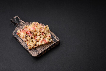 Delicious homemade pizza with sausage, mushrooms and cheese