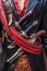 Strasbourg, France - December 13, 2022: Model of a pirate of the Caribbean carrying antique weapons on his belt