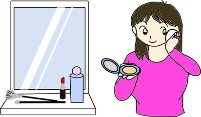 お化粧をする女性