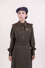 A woman in a retro military uniform, a military police of the Soviet army during World War Two