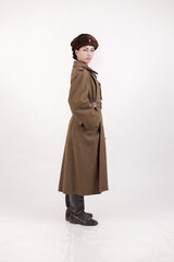 A woman in a retro military uniform, a soldier of the Soviet army during World War Two