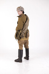 A woman in a retro military uniform, a soldier of the Soviet army during World War Two