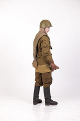 A woman in a retro military uniform, a soldier of the Soviet army during World War Two