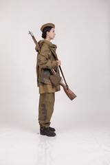 A woman in a retro military uniform, a soldier of the Soviet army during World War Two