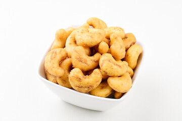 Spicy Cashew in bowl isolated on white background