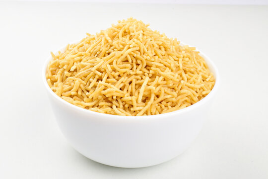 Bhujia namkeen in bowl isolated on white background