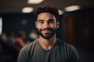 Obraz premium Portrait of a young man smiling while standing in a conference room