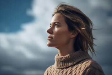 Lifestyle portrait photography of a satisfied woman in her 30s wearing a cozy sweater against a sky and clouds background. Generative AI
