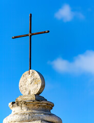 cross on the top of a monument on Mount Carmel 