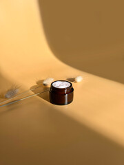 Top view of the zero waste cosmetics container.Open skin care packaging with white cream.Concept of...