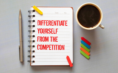Handwritten text DIFFERENTIATE YOURSELF FROM THE COMPETITION next to yellow lighting bulb.