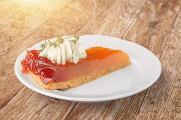 Slice of tasty sweet cake on plate