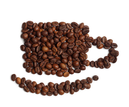 Cup of drink, composition made with coffee beans isolated on white, top view