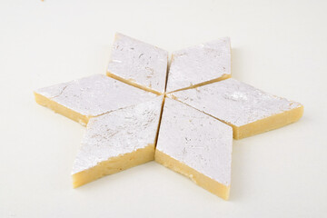 Kaju barfi on white background, famous indian sweet