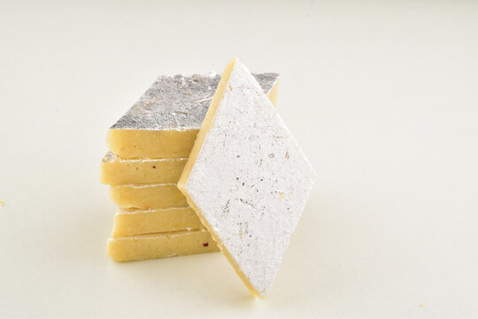 Closeup of kaju katli isolated on white background