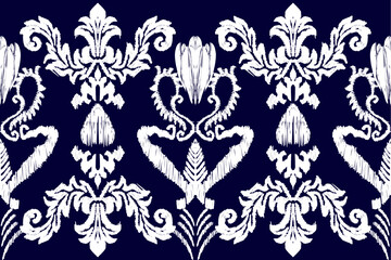 Ikat embroidery on blue background.geometric ethnic oriental pattern traditional.Aztec style abstract vector illustration.ด