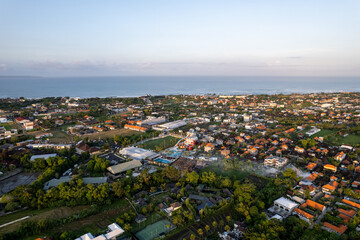 Aerial view of the Canggu area, one of the Bali beachside areas experiencing massive development. The conversion of agricultural land into an entertainment center and housing.