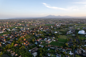 Aerial view of the Canggu area, one of the Bali beachside areas experiencing massive development. The conversion of agricultural land into an entertainment center and housing.