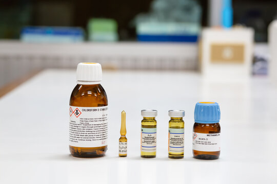 Glass bottles of NMR solvent, chloroform, pyridine, D2O, DMSO, and methanol. The NMR Solvents are used to dissolve samples to prepare solutions for analysis by the NMR spectroscopy method.