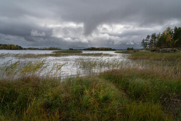 View of the Lake Ladoga near the village Lumivaara on a cloudy autumn day, Ladoga skerries, Republic of Karelia, Russia
