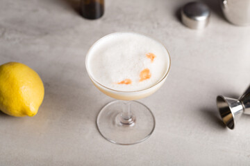 Whiskey Sour cocktail booze bourbon whiskey, lemon juice, simple syrup, egg white and aromatic bitters	