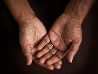 Open hands. Holding, giving, showing concept.Wrinkled old hands offering helping hand.