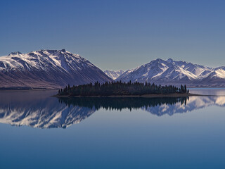 Reflections in Lake Tekapo with mountains in the background