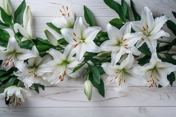 Close-up of blooming lilies on a wooden background