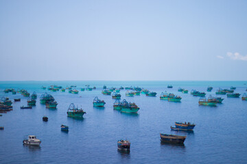 Fishing boats in the blue sea