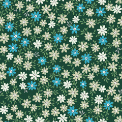 A pattern of small light green and blue flowers with green leaves on a dark green background. Colorful seamless background for textiles, fabric, cotton fabric, covers, wallpaper, prints.